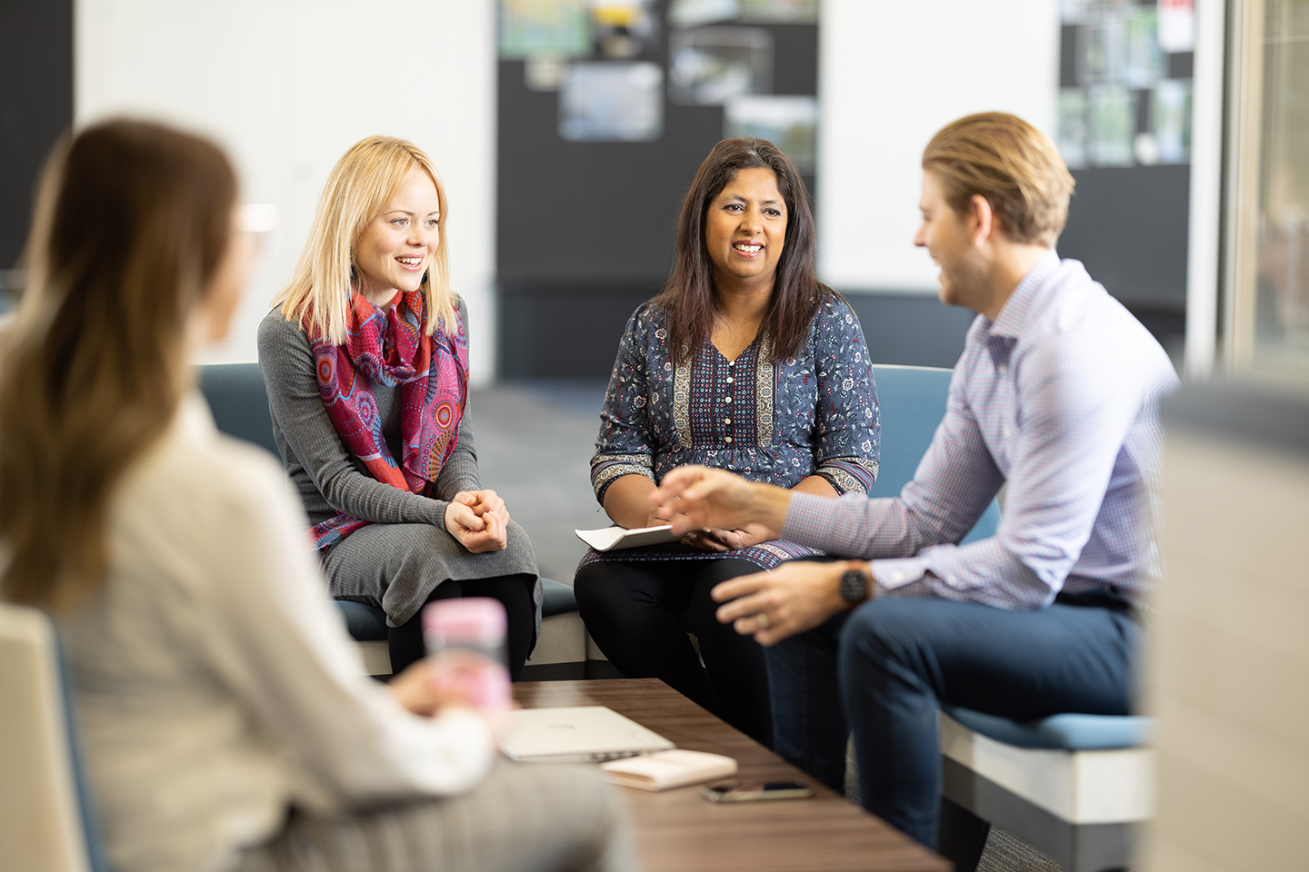 Four teachers have an informal meeting