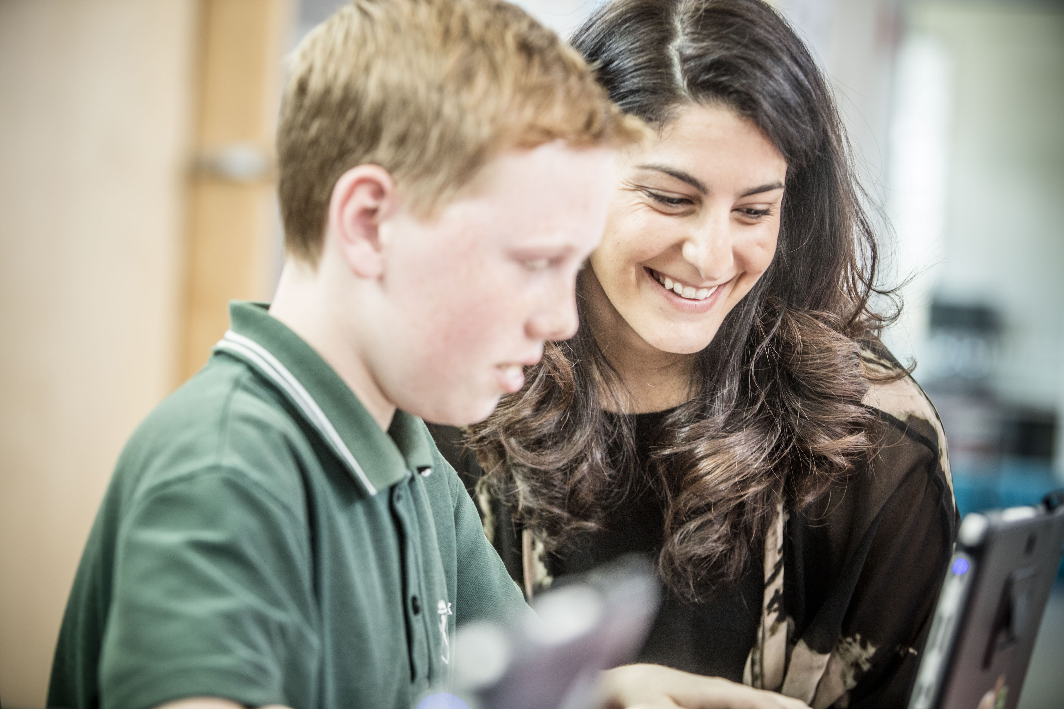 teacher support students in classroom